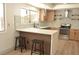 Modern kitchen with light cabinets and island at 1804 Piccolo Way, Las Vegas, NV 89146