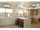 Modern kitchen with island seating and stainless steel appliances at 1804 Piccolo Way, Las Vegas, NV 89146