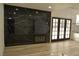 Living room features a marble fireplace and French doors at 1804 Piccolo Way, Las Vegas, NV 89146