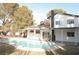 Home's backyard features a kidney-shaped pool and spa at 1804 Piccolo Way, Las Vegas, NV 89146