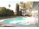 Inviting kidney-shaped pool with spa in backyard at 1804 Piccolo Way, Las Vegas, NV 89146