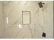 Modern shower with marble tile and niche at 1804 Piccolo Way, Las Vegas, NV 89146