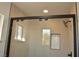 Contemporary shower with glass door and neutral wall tiles at 1804 Piccolo Way, Las Vegas, NV 89146