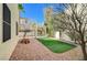 Landscaped backyard with artificial grass at 1805 Grand Rodeo St, Las Vegas, NV 89117