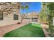 Artificial turf and pergola in backyard at 1805 Grand Rodeo St, Las Vegas, NV 89117