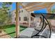 Pergola with swing and artificial turf at 1805 Grand Rodeo St, Las Vegas, NV 89117