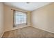 Spacious bedroom featuring a large window and neutral decor at 1805 Grand Rodeo St, Las Vegas, NV 89117