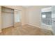 Upstairs bedroom with mirrored closet and access to upper level at 1805 Grand Rodeo St, Las Vegas, NV 89117