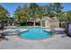 Freeform community swimming pool with a large deck at 1805 Grand Rodeo St, Las Vegas, NV 89117