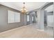 Elegant dining room with hardwood floors and view to entryway at 1805 Grand Rodeo St, Las Vegas, NV 89117