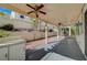 Covered patio with built-in BBQ and ceiling fans at 1805 Grand Rodeo St, Las Vegas, NV 89117