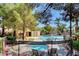 Resort-style pool and spa with lounge chairs and gated access at 1805 Grand Rodeo St, Las Vegas, NV 89117