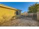 House backyard with storage shed and gravel area at 2210 Cool River Ct, North Las Vegas, NV 89032