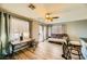 Living room with a brown sofa and access to a patio at 2210 Cool River Ct, North Las Vegas, NV 89032