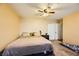 Main bedroom with a king-size bed and plenty of closet space at 2210 Cool River Ct, North Las Vegas, NV 89032