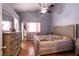 Spacious bedroom with wood floors and large bed at 2535 River Oaks Dr, Las Vegas, NV 89156