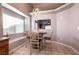 Kitchen nook with a table and chairs, looking into the living room at 2535 River Oaks Dr, Las Vegas, NV 89156