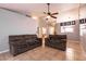 Living room with two sofas and a view of the kitchen and bathroom at 2535 River Oaks Dr, Las Vegas, NV 89156