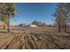 Large backyard with open space and trees at 2670 Zephyr Ave, Pahrump, NV 89048