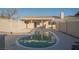 Relaxing kidney-shaped pool in backyard at 2670 Zephyr Ave, Pahrump, NV 89048