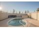 Inviting kidney-shaped pool with a surrounding patio at 2670 Zephyr Ave, Pahrump, NV 89048