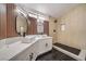 Elegant bathroom with double vanity and walk-in shower at 2674 Alwoodley Cir, Las Vegas, NV 89142