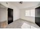 Bright bedroom with carpet flooring and modern closet at 2674 Alwoodley Cir, Las Vegas, NV 89142