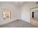 Bedroom with large window and access to closet at 2674 Alwoodley Cir, Las Vegas, NV 89142