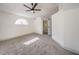 Bright bedroom with ceiling fan and modern closet at 2674 Alwoodley Cir, Las Vegas, NV 89142