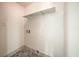 Laundry area with shelving and patterned tile floor at 2674 Alwoodley Cir, Las Vegas, NV 89142