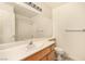 Clean bathroom with a vanity, toilet and shower/tub combo at 2849 Huber Heights Dr, Las Vegas, NV 89128