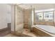 Large bathroom with walk-in shower and built-in bench at 2849 Huber Heights Dr, Las Vegas, NV 89128