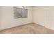 Well-lit bedroom with window and neutral walls at 2849 Huber Heights Dr, Las Vegas, NV 89128