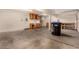 Spacious garage with workshop cabinets and storage at 2849 Huber Heights Dr, Las Vegas, NV 89128