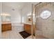 Elegant bathroom with a large shower and double sinks at 3361 Winery Rd, Pahrump, NV 89048