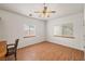 Bright bedroom with wood flooring and window blinds at 3361 Winery Rd, Pahrump, NV 89048