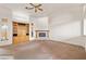 Living room featuring a built-in entertainment center and a fireplace at 3361 Winery Rd, Pahrump, NV 89048