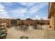 Outdoor patio with seating, grill, and fountain feature at 3361 Winery Rd, Pahrump, NV 89048