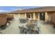 Spacious patio with seating areas and access to house at 3361 Winery Rd, Pahrump, NV 89048