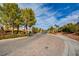 Paved road leads into a residential community at 3402 Arcata Point Ave, Las Vegas, NV 89141