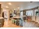 Spacious kitchen with granite island, stainless steel appliances, and farmhouse-style cabinets at 3402 Arcata Point Ave, Las Vegas, NV 89141