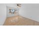 Bright bedroom with wood flooring and ceiling fan at 3425 E Russell Rd # 121, Las Vegas, NV 89120