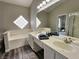 Bathroom with double vanity, soaking tub, and separate shower at 3538 Canter Dr, North Las Vegas, NV 89032