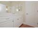 Clean bathroom with white cabinets and tiled shower at 36 Hunt Valley Trl, Henderson, NV 89052