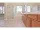 Bright bathroom featuring double vanity, large mirror, tub, and glass shower at 36 Hunt Valley Trl, Henderson, NV 89052