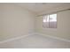 Bedroom with carpeted floor and window at 36 Hunt Valley Trl, Henderson, NV 89052