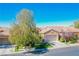 One-story house with a two-car garage and landscaped yard at 36 Hunt Valley Trl, Henderson, NV 89052