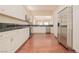 Modern kitchen featuring stainless steel appliances and hardwood floors at 36 Hunt Valley Trl, Henderson, NV 89052