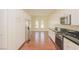 Modern kitchen with stainless steel appliances, gas cooktop, and white cabinetry at 36 Hunt Valley Trl, Henderson, NV 89052