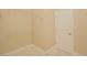 Walk-in closet featuring white walls, neutral carpeting and white, wire shelving at 36 Hunt Valley Trl, Henderson, NV 89052